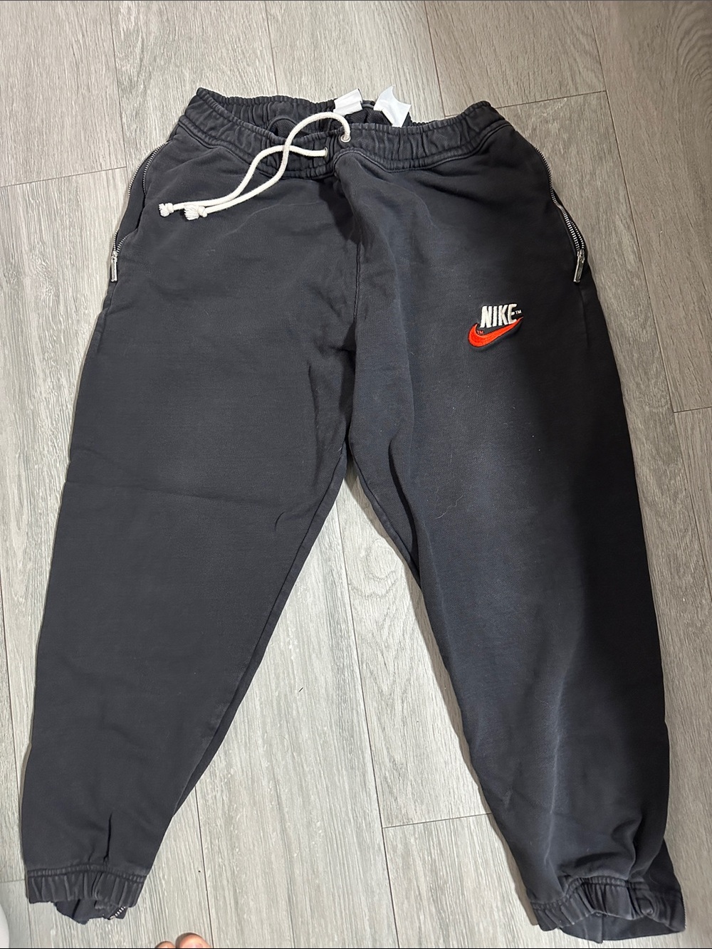 Nike Black Sweatpants with Orange Swoosh